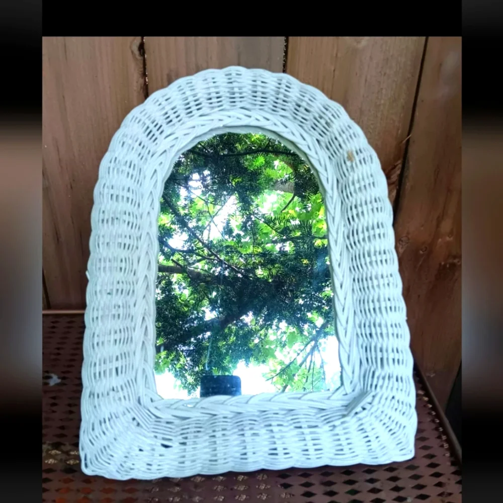 Vintage white wicker mirror rattan behind shabby